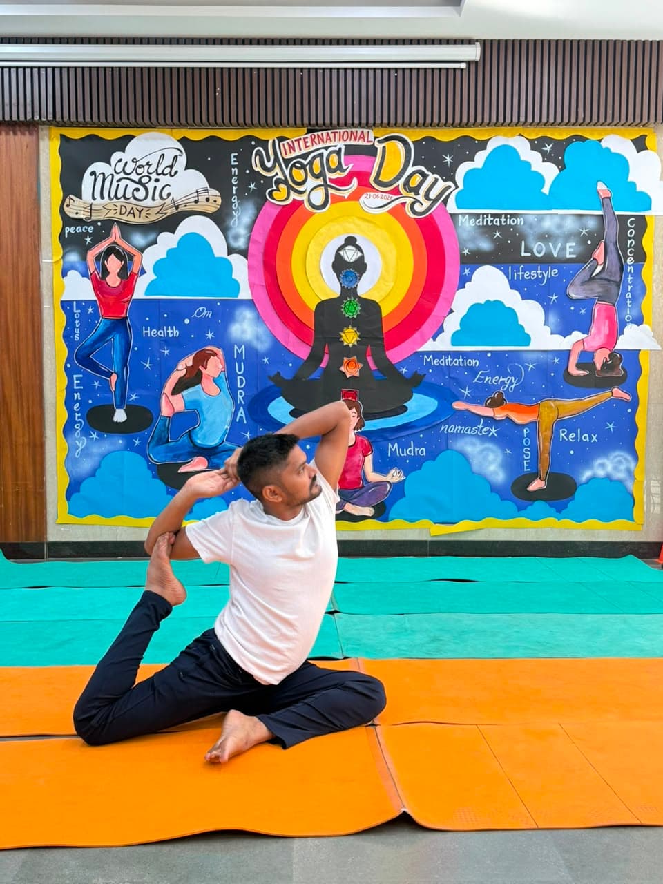 Yoga teacher in a seated king pigeon pose